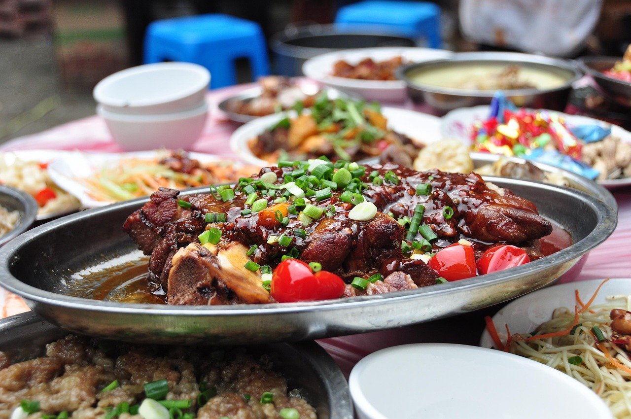 Festive spread featuring traditional Chinese New Year rabbit meat dishes Malaysia home cooks prepare.